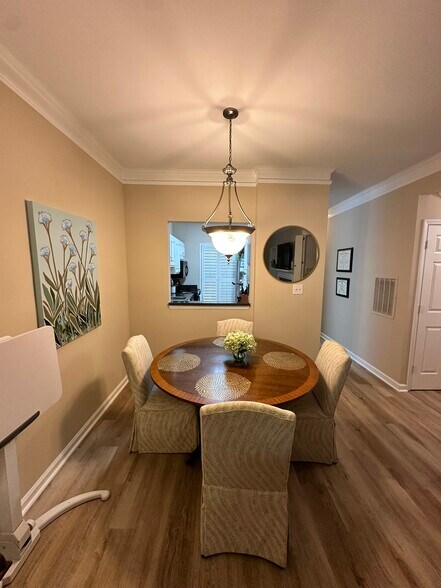 Dining area with kitchen pass through - 301 Queens Rd