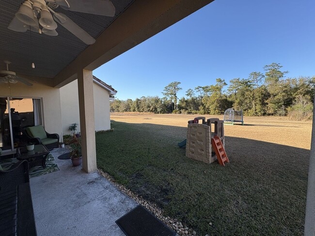 Building Photo - Florida Living Starts Here — Gated, Single-Story, Move-In Ready May 1!