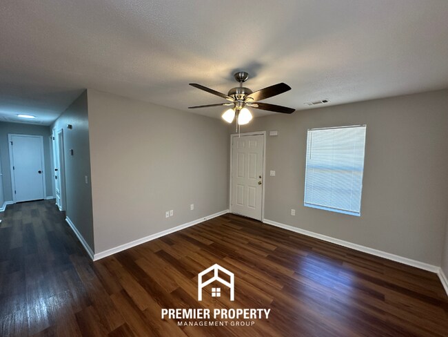 Building Photo - Spacious 4BR/2BA Home in 38141 | Vinyl Flooring & Large Fenced Backyard