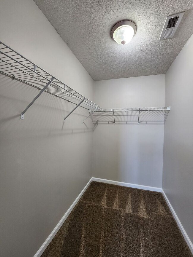 Building Photo - Beautiful 3 bed 2 1/2 bath townhome in a gated community with a pool. Showings Coming Soon!!!