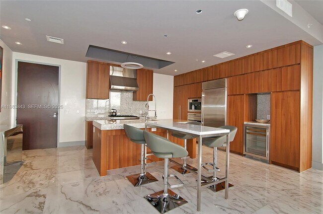 Building Photo - 9705 Collins Ave