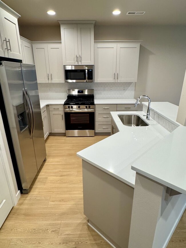 Building Photo - Brand New! 3 Bedroom / 2 Bath Townhome wit...