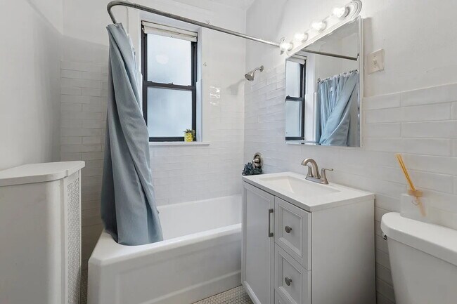 Building Photo - Premium Unit with Modern Upgrades