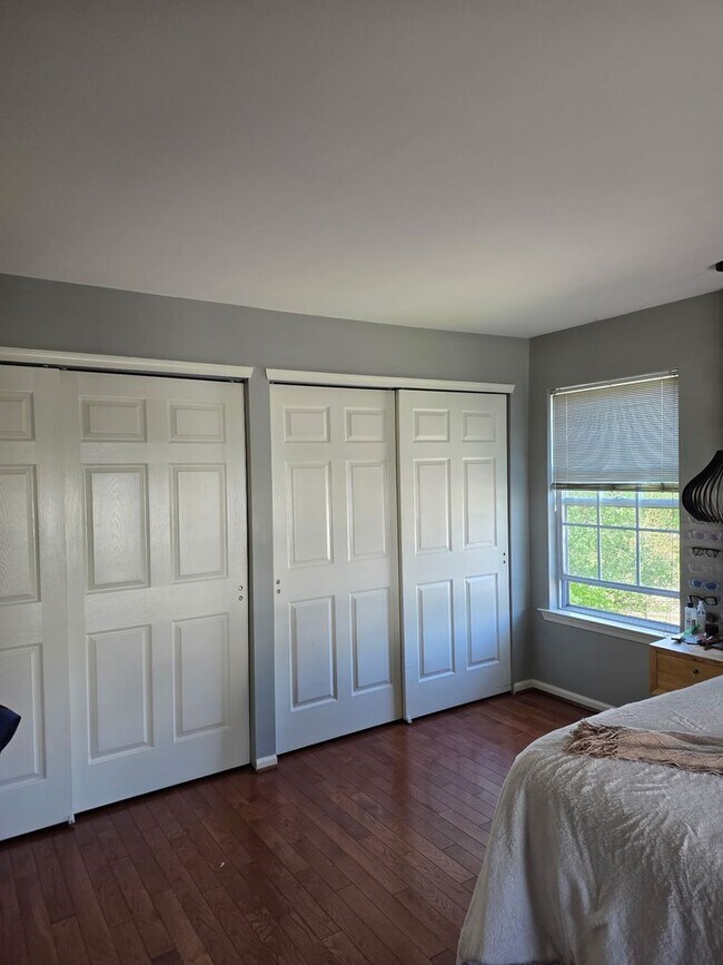 Building Photo - Stunning 3–4 Bedroom Townhome in Private Community | Garage + EV Charger | Deck with Tree Views