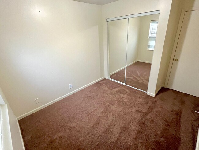 Building Photo - Updated Cully Neighborhood 3 Bedroom Townhome with Hardwoods, Fully Fenced Yard