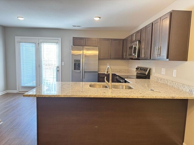 Building Photo - Luxury Living at its best! 2 Bed 2 1/2 Bath Townhome near Downtown!