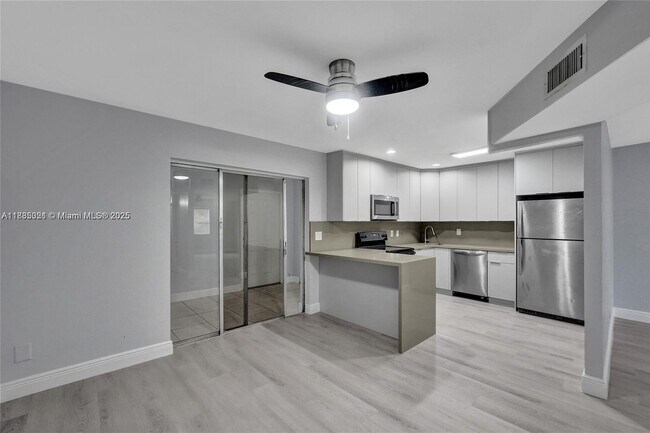 Building Photo - 5963 NW 25th Ct