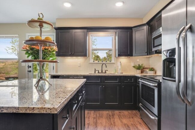 Building Photo - Serrano Townhomes with a finished basement...