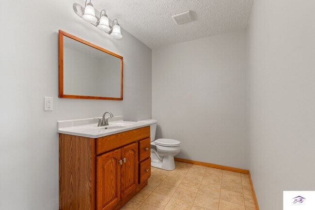 Building Photo - Available now! Spacious 3 Bed, 3 Bath Home with Modern Open Layout & Lawn Care Included