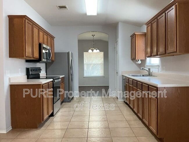 Building Photo - 9005 Sun Shower Bend