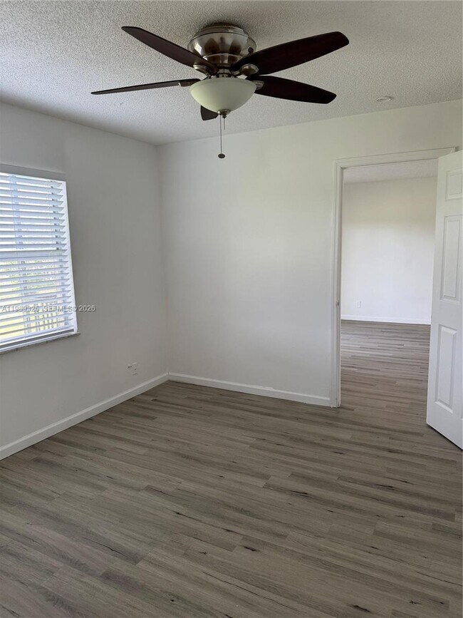 Building Photo - 6301 N Falls Cir Dr