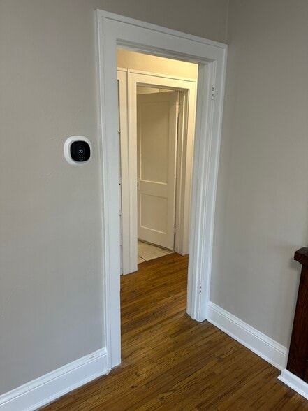 Hallway to bedrooms and bathroom - 235 Logan Ave N