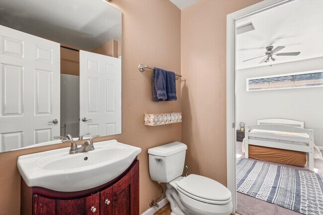 Building Photo - Prime Location | Spacious 4BD Home with El...