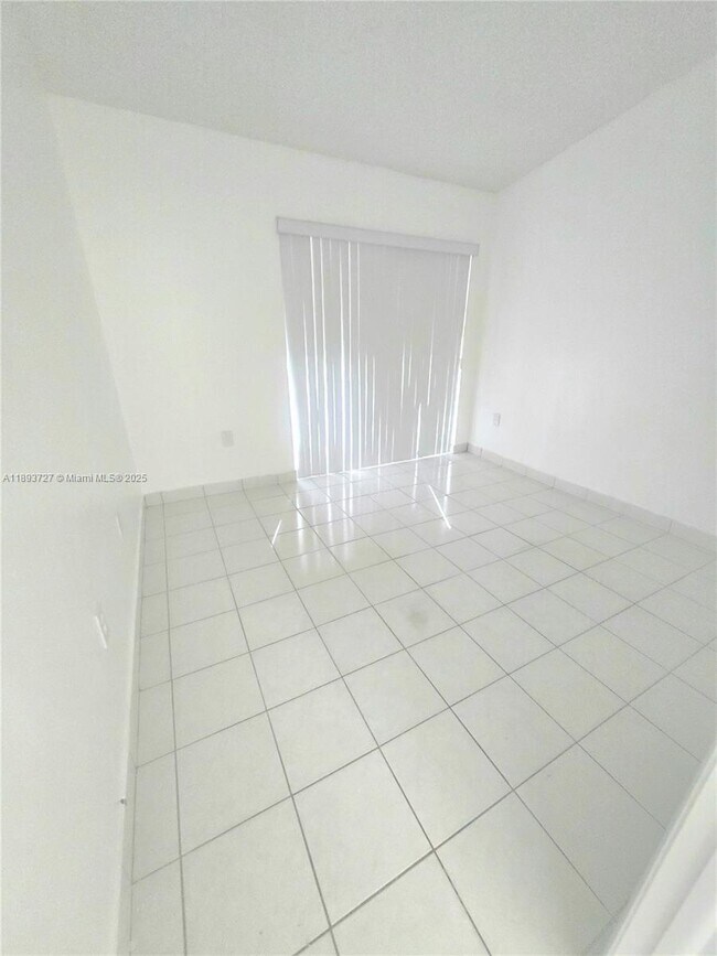 Building Photo - 18875 NW 62nd Ave