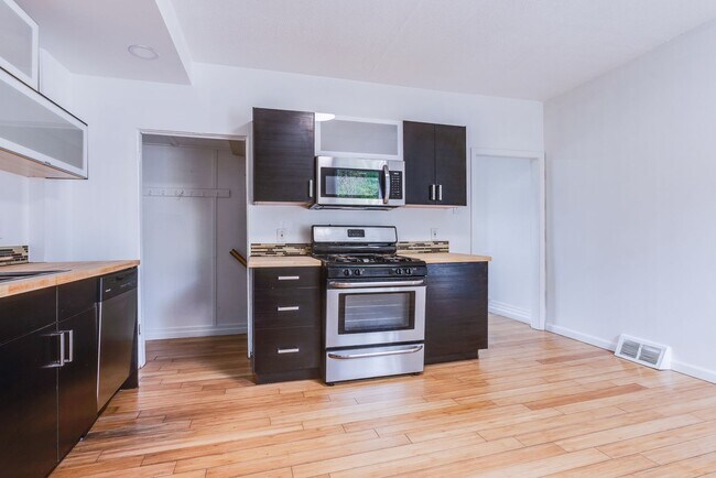 Building Photo - Available JULY 2026 - BEAUTIFULLY RENOVATED 3 Bedroom Home in the South Side Slopes!