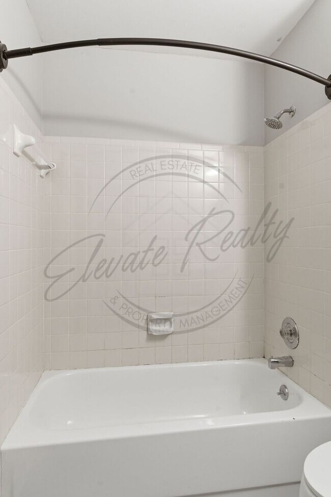 Building Photo - SPRING SPECIAL!! FIRST MONTH FREE on this Two Bedroom Condo, Garden Level with Washer/Dryer Hook ...