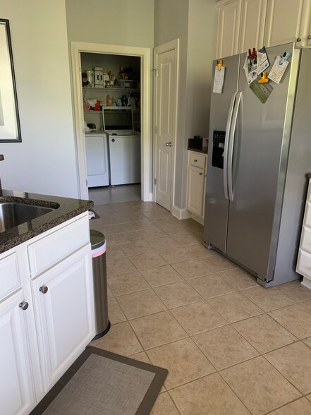 Kitchen view to laundry - 2000 Belle Isle Ave
