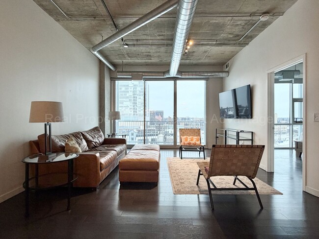 Building Photo - 2BR/2BA Skylofts Condo with Balcony & Garage Parking