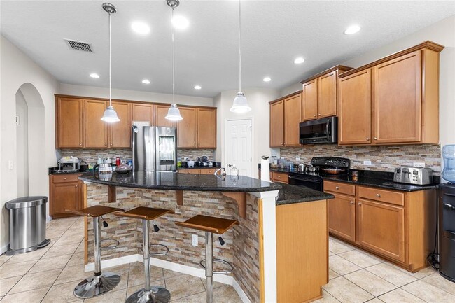 Building Photo - 6102 Roseate Spoonbill Dr