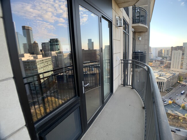 Balcony with convenient gas outlet for grill and breathtaking views of the city. - 500 E Grant St