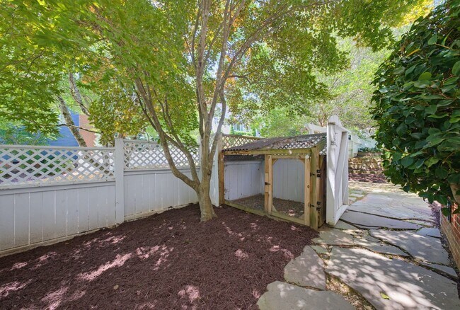 Building Photo - Southern Charm Meets Everyday Entertainment and Convenience!