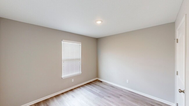 Building Photo - New Construction! Beautiful Townhome!