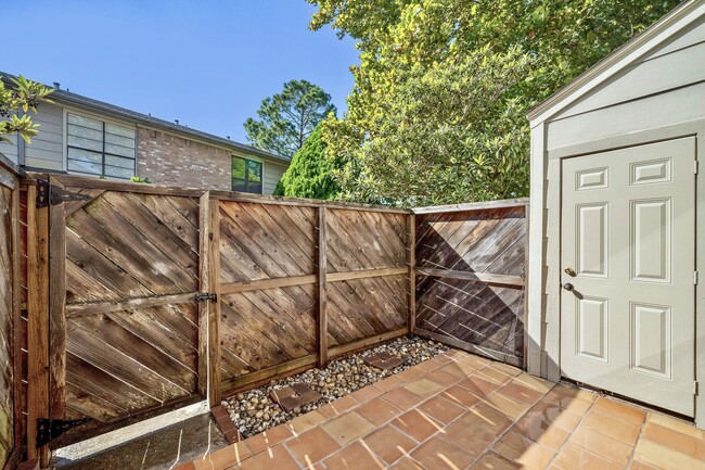 Private courtyard - Storage Room Door - 8801 Hammerly Blvd