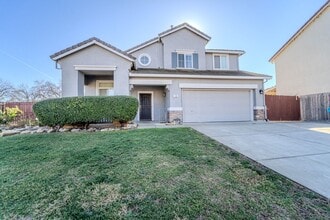 Building Photo - ? Spacious 4-Bedroom, 2.5-Bathroom Home in...