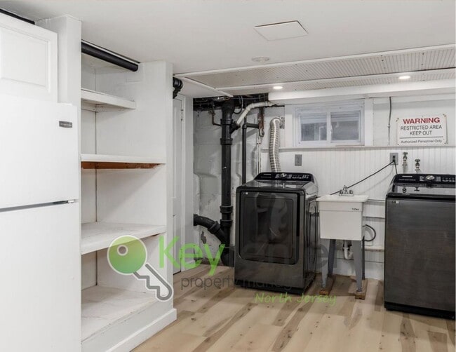 Building Photo - Spacious 3-Bed, 2-Bath Nutley Home with Bonus Office, Multi-Level Deck & Quiet Location