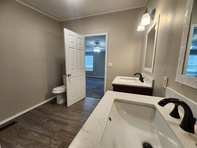 Building Photo - 3 bed, 2 bath w/ Front & Back Decks, 1/4 Acre of land, FENCED backyard