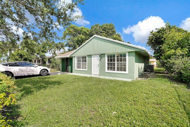 Building Photo - 3541 NW 7th Pl