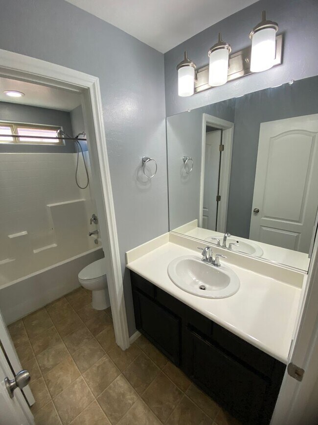 Building Photo - AMERICANA Property Mgmt - Beautiful 4 beds...