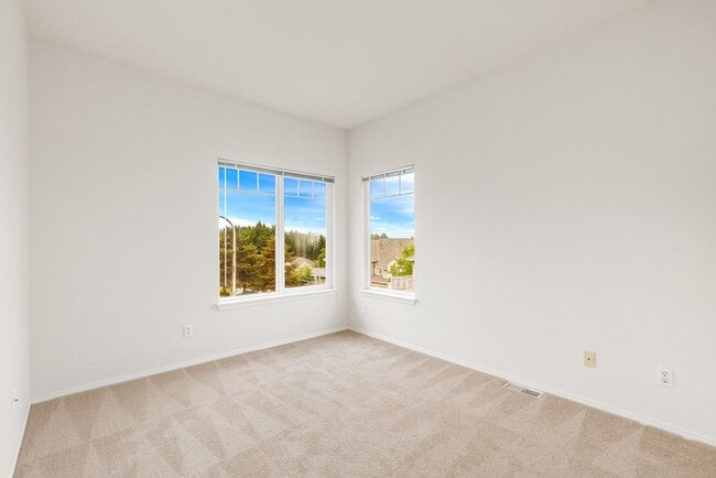 Building Photo - End Unit 2 Story Townhome Plus Bonus Office Area - 2 Car Garage