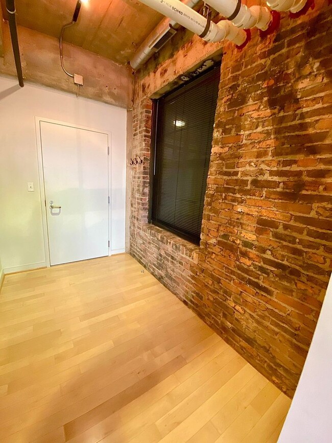 Building Photo - Stunning Industrial-Contemporary One Bedro...