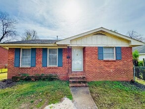 Building Photo - Charming 3-Bedroom Brick Home with Beautiful Hardwoods!