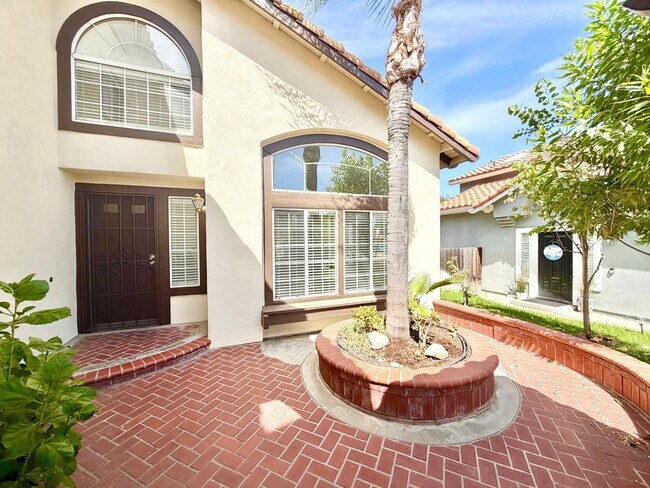 Building Photo - Spacious 5 Bedroom 3 Bathroom Home with Updated Paint, New Roof & Private Balcony