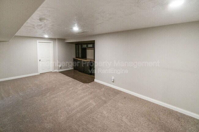 Building Photo - 6415 S Woodland Ct