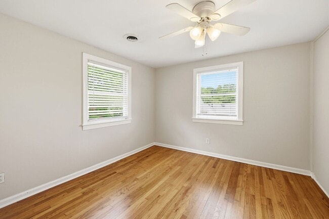 Building Photo - Updated 2BR Condo | Walk to Village District + Private Deck!