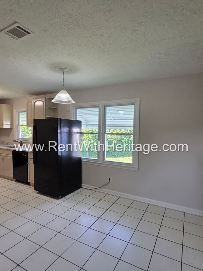 Building Photo - 5990 Peco Ln