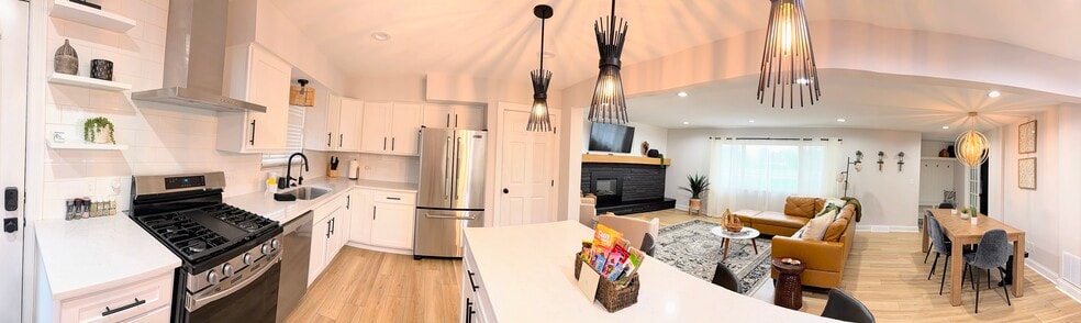 Pendant lights that dim, beautiful island counter and appliances - this is your dream kitchen! - 7621 Central College Rd