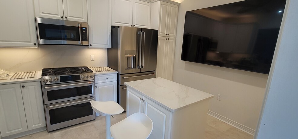 Gourmet Kitchen with GE Cafe Appliances - 1292 Laskin Rd