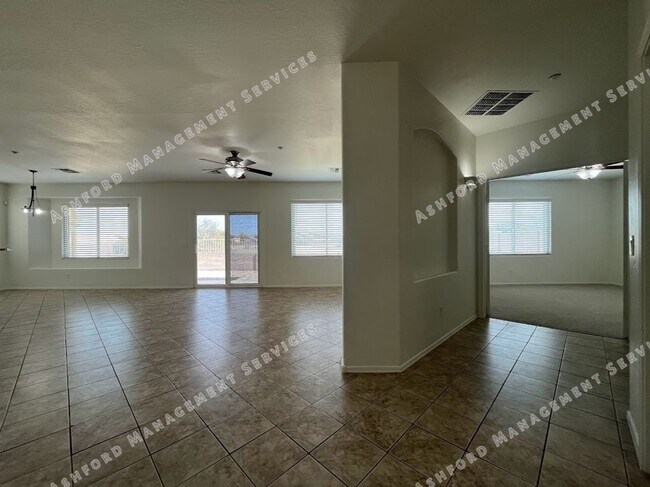 Building Photo - Well-Priced 3-Bedroom Plus Den in Gated Ru...
