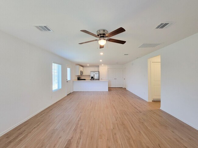 Building Photo - This single-story home has a comfortable layout with three bedrooms and a living area all on one ...