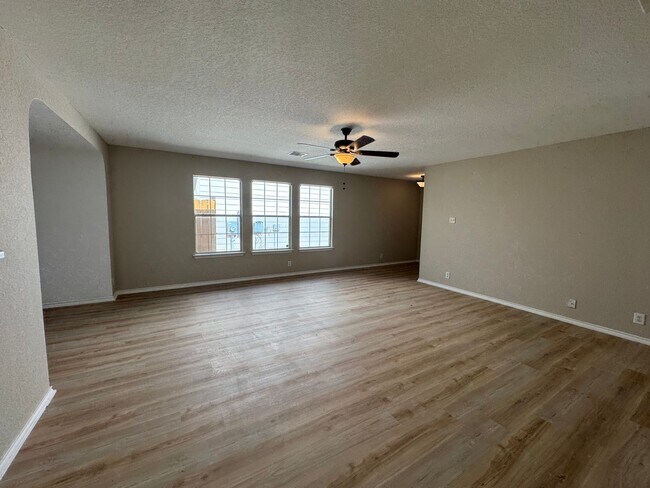 Building Photo - NEW PAINT, FLOORING, APPLIANCES & ROOF  | ...