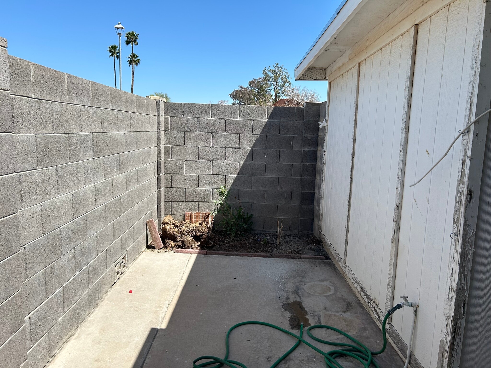 Outside back side patio - 10464 W Oakmont Dr