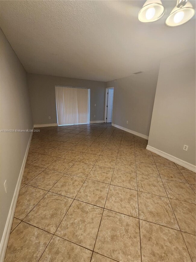 Building Photo - 10960 NW 29th Ct