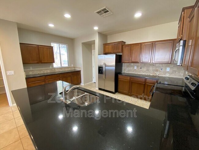 Building Photo - 36971 W Oliveto Ave