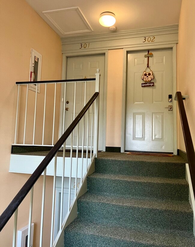 Front door, unit 301 - 1137 Huntmaster Ter NE