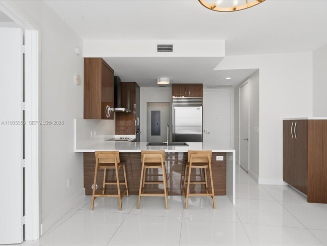 Building Photo - 18201 Collins Ave