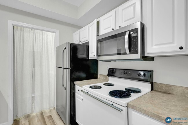 Building Photo - 1BR / 1BA Condo in Gated Summer House Comm...